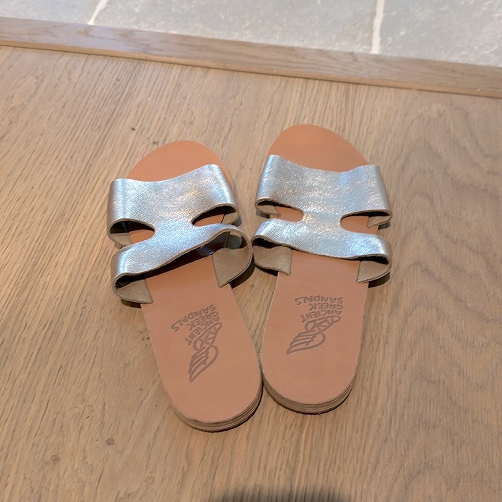 New Ancient Greek sandals worn once. Rose gold leather strap